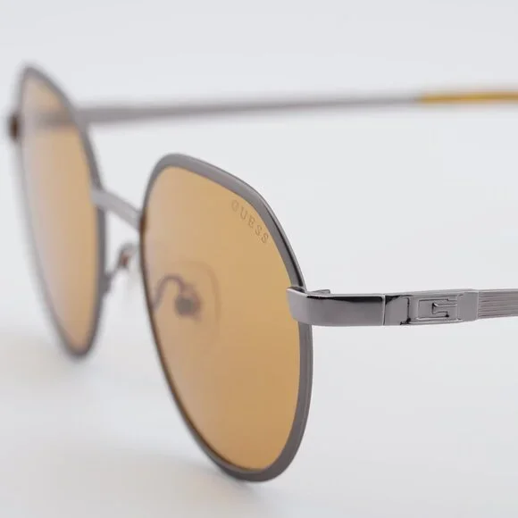 Guess GU00207 09E Sunglasses Gunmetal Round Frame, Brown Lenses